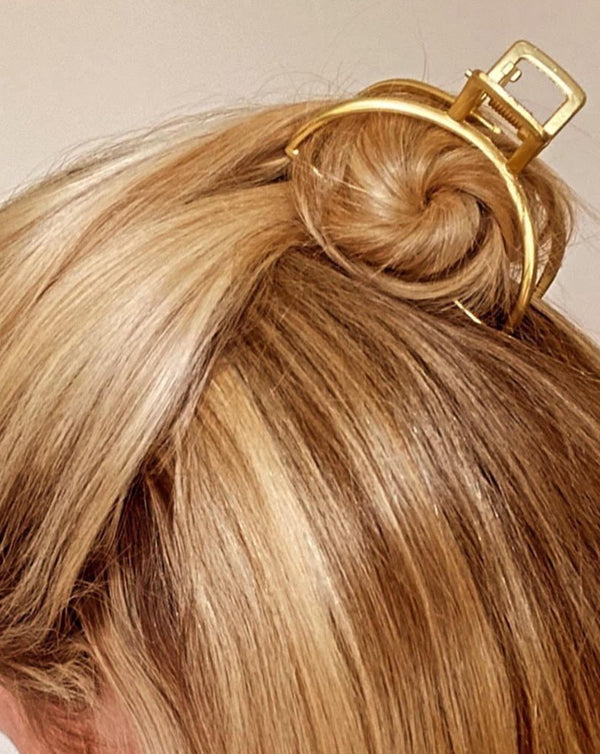 Gold toned hair claw